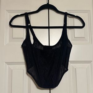 Urban Outfitter out from under size S black corset. Never Worn.